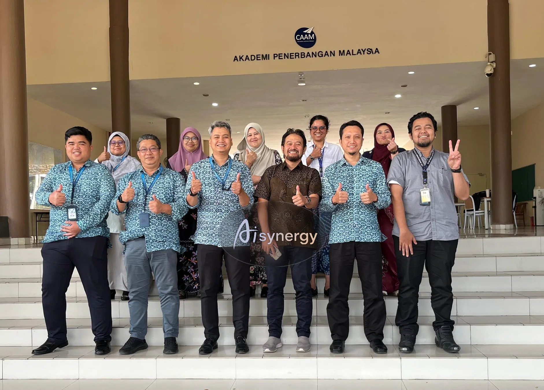 AISynergy trainer with participants at the close of a training session at Akademi Penerbangan Malaysia