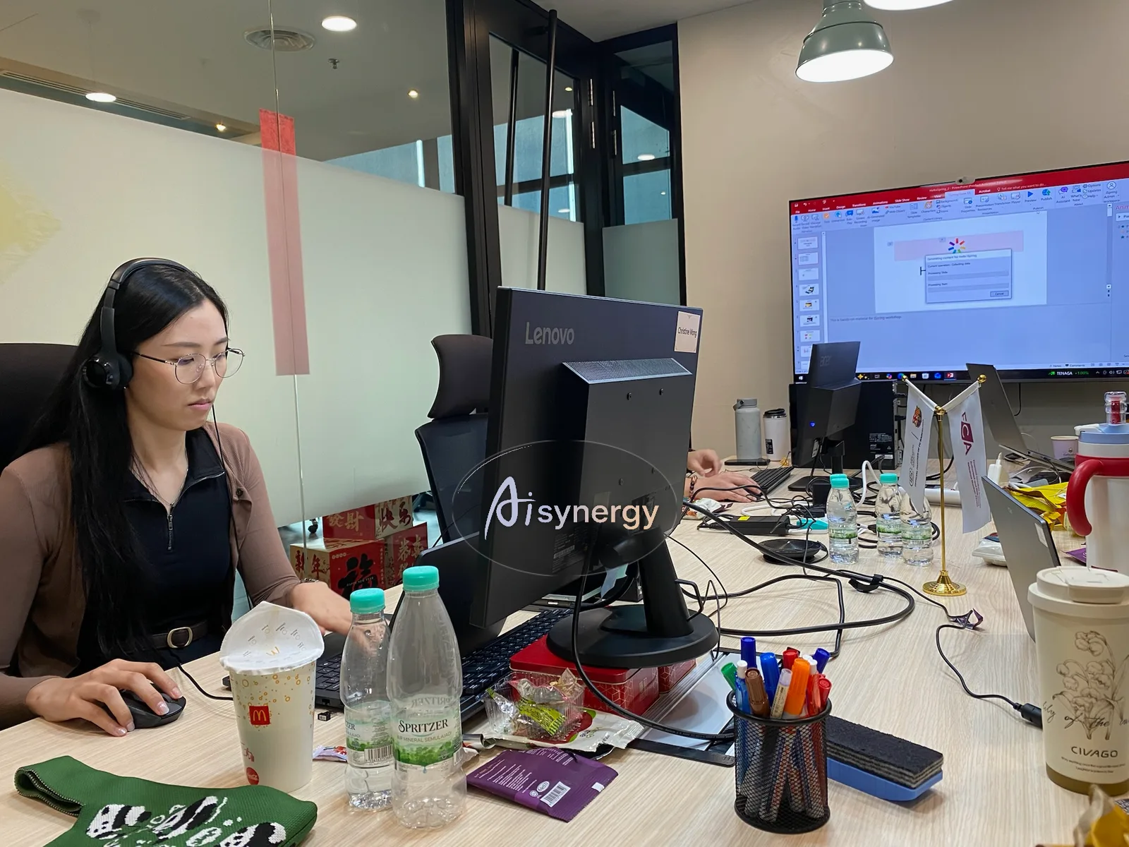 A team member working at their own desk and screen during a hands-on session