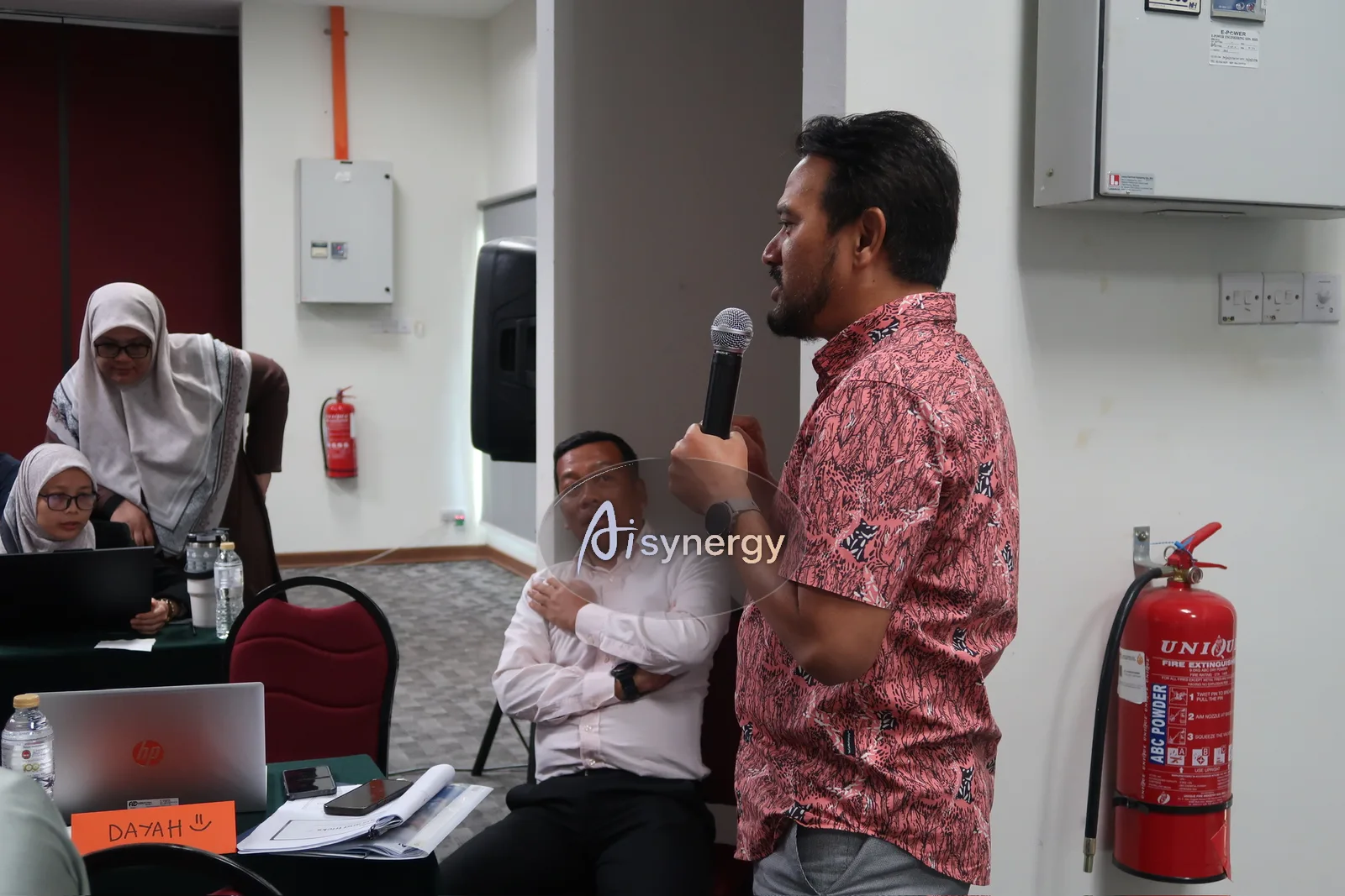 Officers raising their own use cases during a discussion in a training session